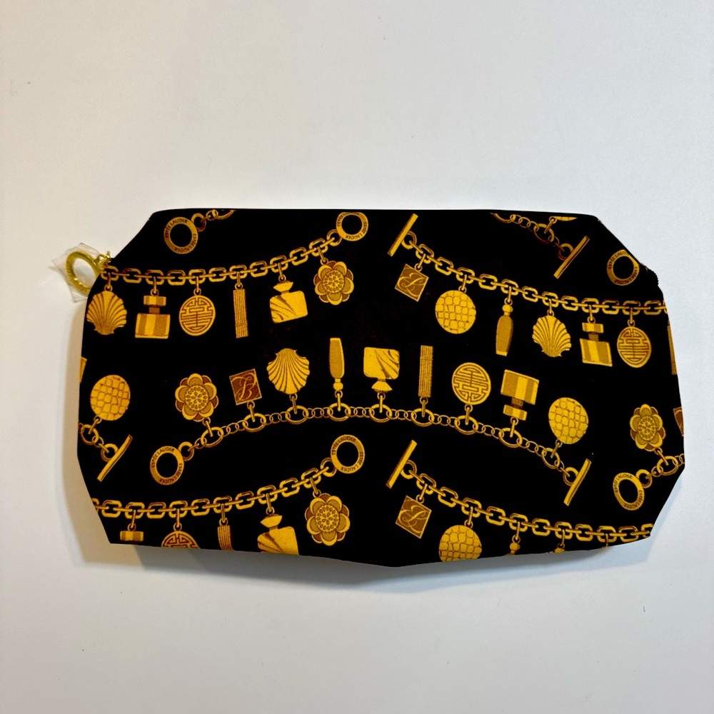 Vintage Estée Lauder brown and gold cosmetic bag